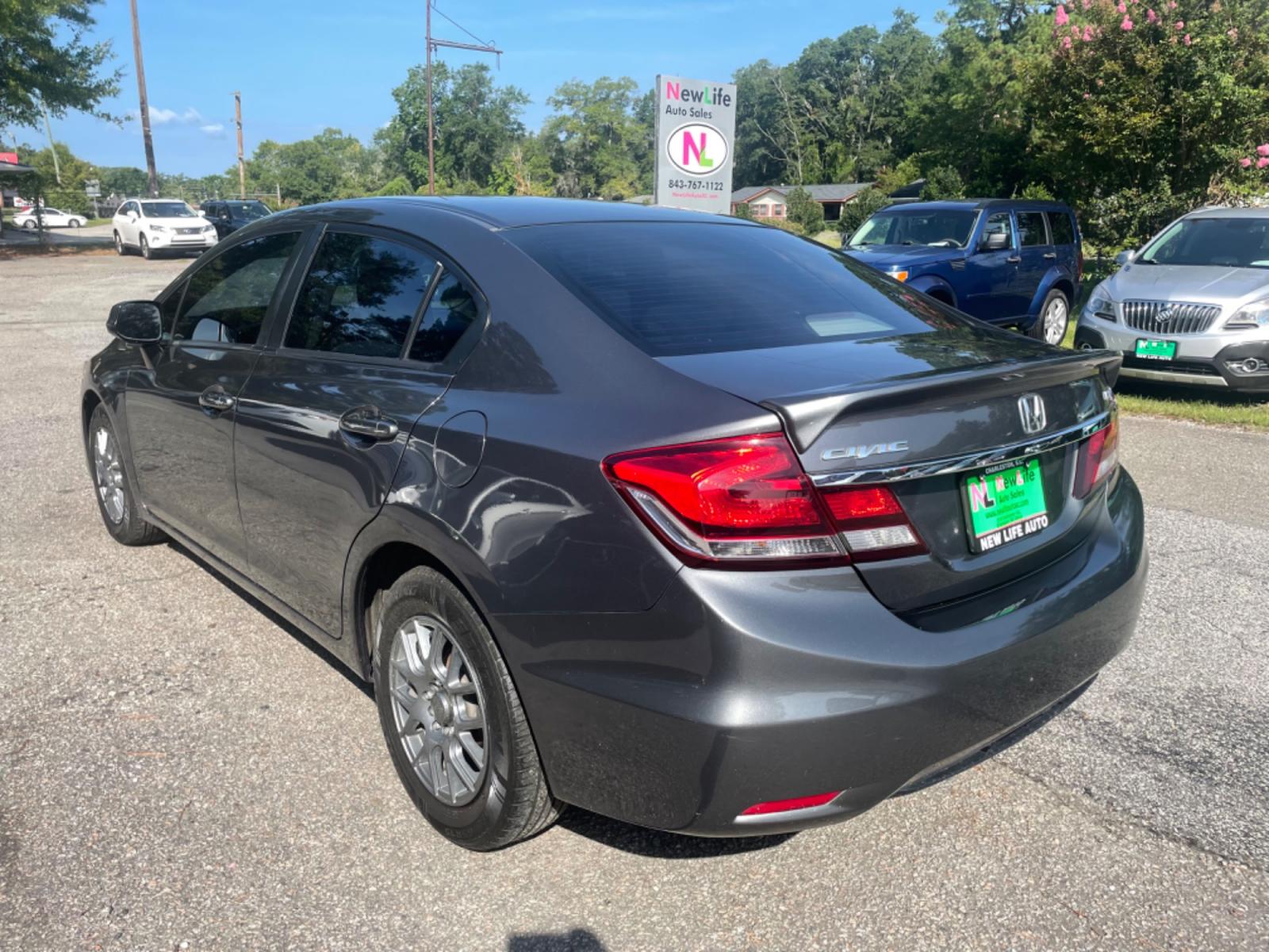 2013 GRAY HONDA CIVIC HF (2HGFB2F65DH) with an 1.8L engine, Automatic transmission, located at 5103 Dorchester Rd., Charleston, SC, 29418-5607, (843) 767-1122, 36.245171, -115.228050 - This Hybrid vehicle boasts an average 28 mpg in the city and 41 mpg on the highway!! Super Clean interior with CD/AUX/AM/FM, Hands-free Phone, Backup Camera, Power Windows, Power Locks, Power Mirrors, Econ Mode, Keyless Entry, Alloy Wheels. 116k miles Located at New Life Auto Sales! 2018-2023 Top 5 - Photo #3