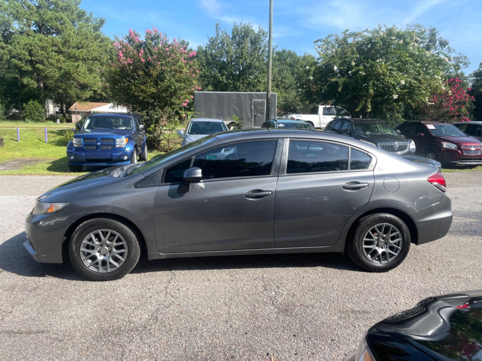 2013 GRAY HONDA CIVIC HF (2HGFB2F65DH) with an 1.8L engine, Automatic transmission, located at 5103 Dorchester Rd., Charleston, SC, 29418-5607, (843) 767-1122, 36.245171, -115.228050 - This Hybrid vehicle boasts an average 28 mpg in the city and 41 mpg on the highway!! Super Clean interior with CD/AUX/AM/FM, Hands-free Phone, Backup Camera, Power Windows, Power Locks, Power Mirrors, Econ Mode, Keyless Entry, Alloy Wheels. 116k miles Located at New Life Auto Sales! 2018-2023 Top 5 - Photo #4