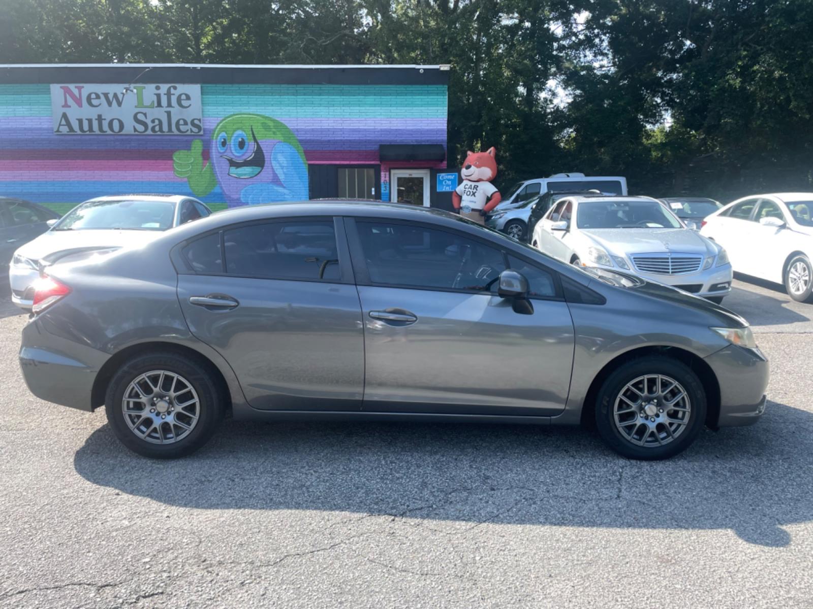 2013 GRAY HONDA CIVIC HF (2HGFB2F65DH) with an 1.8L engine, Automatic transmission, located at 5103 Dorchester Rd., Charleston, SC, 29418-5607, (843) 767-1122, 36.245171, -115.228050 - This Hybrid vehicle boasts an average 28 mpg in the city and 41 mpg on the highway!! Super Clean interior with CD/AUX/AM/FM, Hands-free Phone, Backup Camera, Power Windows, Power Locks, Power Mirrors, Econ Mode, Keyless Entry, Alloy Wheels. 116k miles Located at New Life Auto Sales! 2023 WINNER for - Photo #7