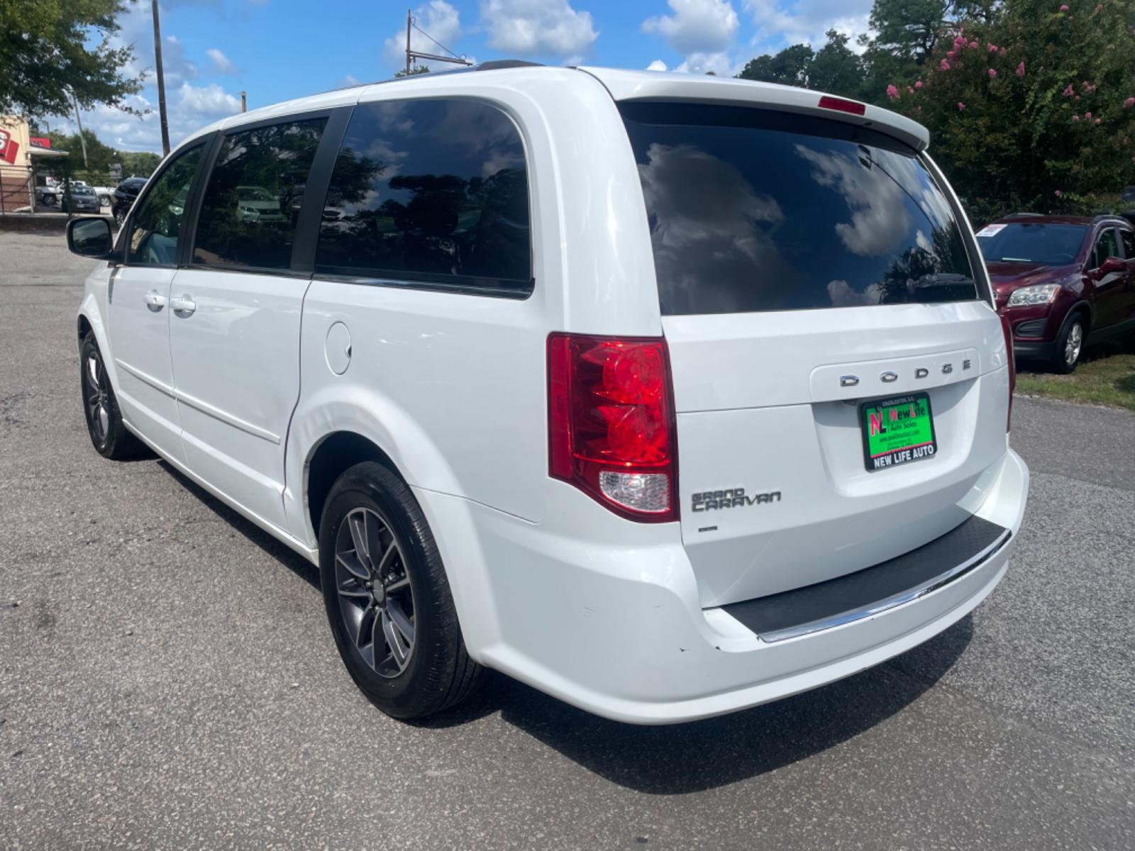 2017 WHITE DODGE GRAND CARAVAN SXT (2C4RDGCG3HR) with an 3.6L engine, Automatic transmission, located at 5103 Dorchester Rd., Charleston, SC, 29418-5607, (843) 767-1122, 36.245171, -115.228050 - Local Trade-in with comfy Leather/Suede Interior, CD/AUX/USB/Sat/Bluetooth, Dual Climate Control, Power Everything (windows, locks, seat, mirrors), Power Liftgate, Power Sliding Doors, Rear Climate Control, Keyless Entry, Alloy Wheels. 140k miles Located at New Life Auto Sales! 2018-2023 Top 5 Fina - Photo #4