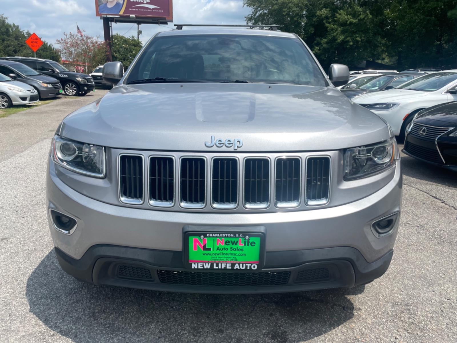 2014 SILVER JEEP GRAND CHEROKEE LAREDO (1C4RJFAG3EC) with an 3.6L engine, Automatic transmission, located at 5103 Dorchester Rd., Charleston, SC, 29418-5607, (843) 767-1122, 36.245171, -115.228050 - Super clean interior with AUX/USB/Bluetooth, Power Everything (windows, locks, seat, mirrors), Push Button Start, Keyless Entry, Luggage Rack, Tow Package, Alloy Wheels. 122k miles Located at New Life Auto Sales! 2018-2023 Top 5 Finalist for Charleston City Paper's BEST PLACE TO BUY A USED CAR! 510 - Photo #1
