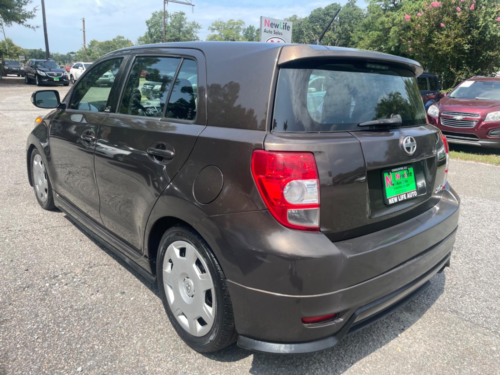 2011 BROWN SCION XD (JTKKU4B48B1) with an 1.8L engine, 5-Speed Manual transmission, located at 5103 Dorchester Rd., Charleston, SC, 29418-5607, (843) 767-1122, 36.245171, -115.228050 - Easy to maintain & great on fuel economy with CD/AUX/USB, Power Windows, Power Locks, Power Mirrors, 5-Speed Manual Transmission, Reclining/Sliding Rear Seats, Rear seats fold down making a great cargo space! Only 99k miles!! Located at New Life Auto Sales! 2018-2023 Top 5 Finalist for Charleston C - Photo #4
